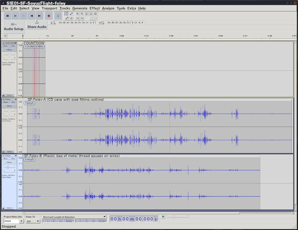 Three tracks open in Audacity sound editor. The top one is named "COUNTDOWN" and has only the sharp peaks from the countdown timer in Kdenlive. The other two are labeled "FOLEY A" and "FOLEY B", with complex envelopes for the recorded sound.